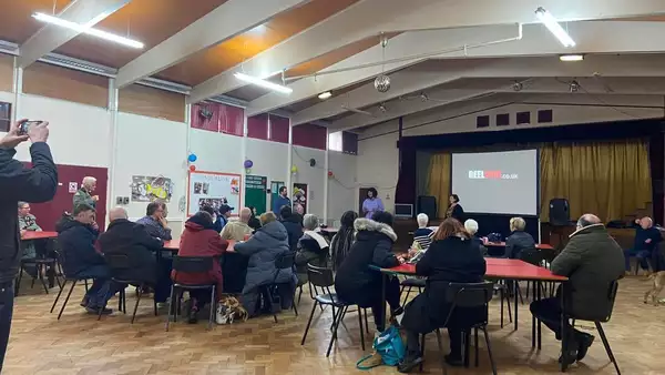Photo of people gathering at a film screening by ReelMCR
