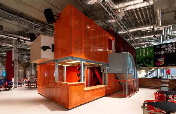 Our information desk which is in a large orange box structure