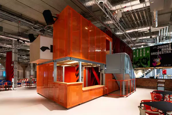 Our information desk which is in a large orange box structure