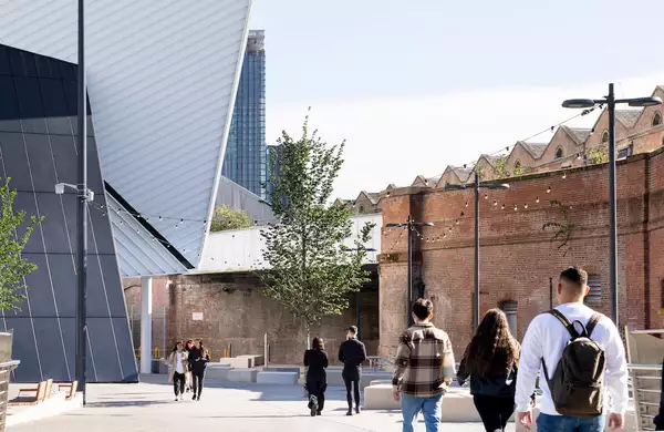 visitors walking towards Aviva Studios