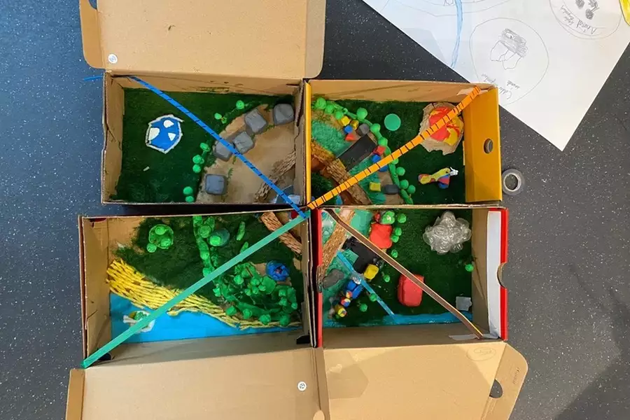 Four decorated shoeboxes