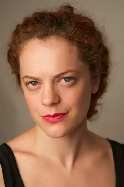Headshot of Laura Careless wearing a black top