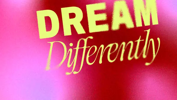 A bold, artistic graphic with the words "DREAM Differently" in yellow text against a red and pink gradient background with a grainy texture.