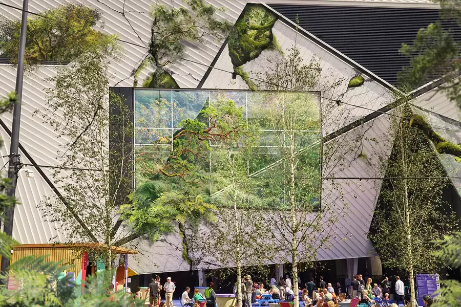 Aviva Studios x Trespass with vines and greenery covering the building