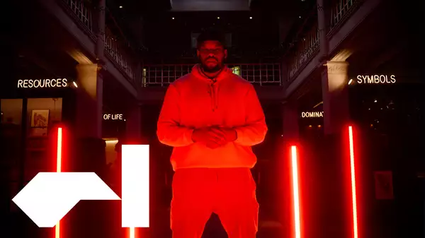 Poet and spoken word artist Griot Gabriel performing in Manchester Museum's natural history gallery
