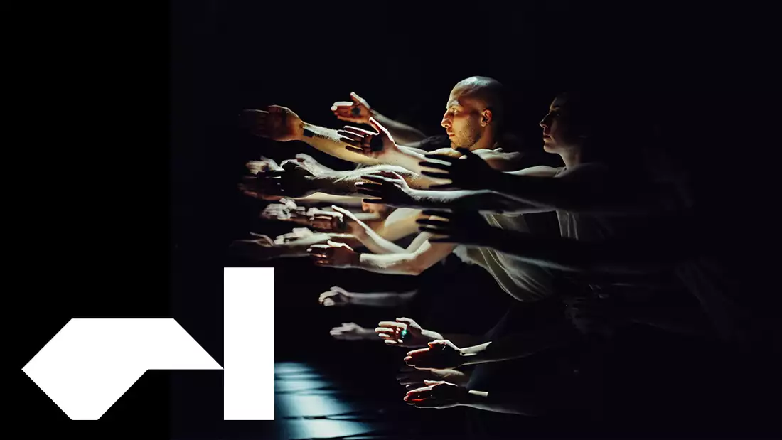 A still from the trailer for Figures in Extinction, showing a group of dancers stretching their arms out on a black background. The factory international logo is on the bottom left corner.