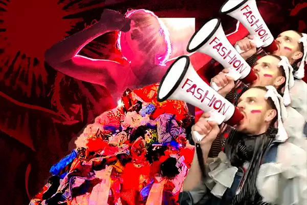 man shouting into a megaphone which reads 'Rebels of Exintion'