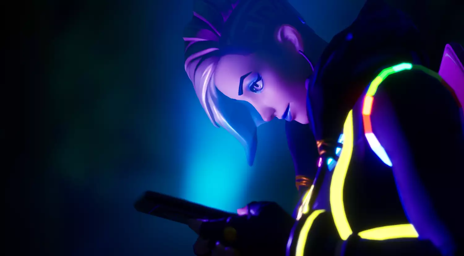 A screenshot of LaTurbo Avedon in Fortnite Creative - they are shot from the left side, and their face is lit by the blue light of the phone they are looking at.